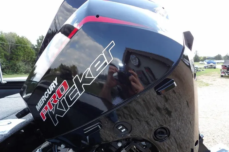 Slide: The Image of Close-up of Mercury Pro Kicker engine on 2026 Lund 2075 Pro-V Sport boat. - 69
