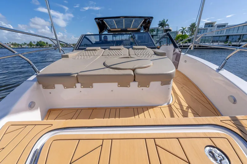 Slide: The Image of Luxurious 2026 Hanover 347 boat with spacious sun deck and modern design on a sunny day. - 13