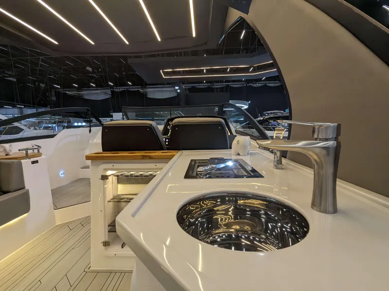 Slide: The Image of 2025 Hanover 347 Inboard yacht interior with modern sink and sleek design. - 17