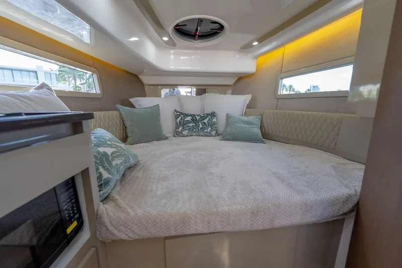 Slide: The Image of Luxurious interior of 2026 Hanover 347 yacht with cozy bed and elegant decor. - 24