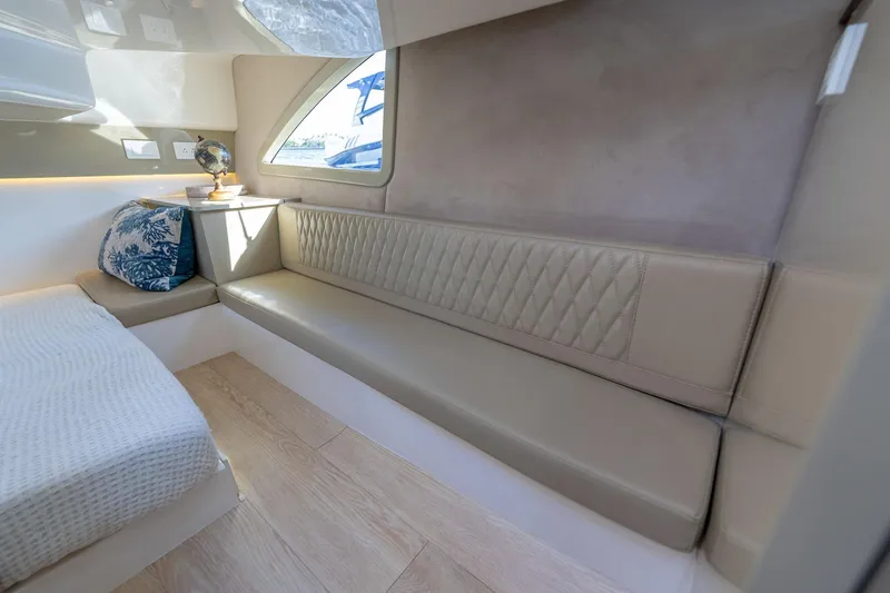 Slide: The Image of Luxurious interior of Hanover 347 yacht, featuring elegant seating and modern decor, 2026 model. - 27