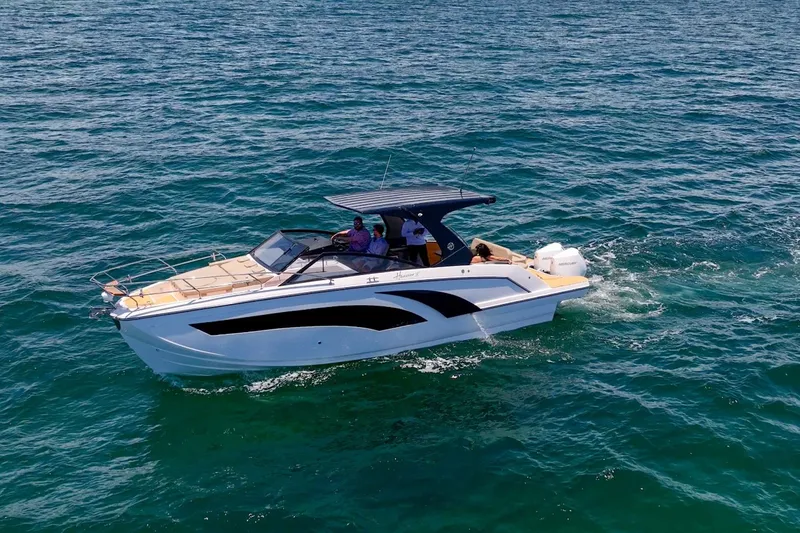 Slide: The Image of A sleek Hanover 347 boat cruising on open water, 2026 model. - 4