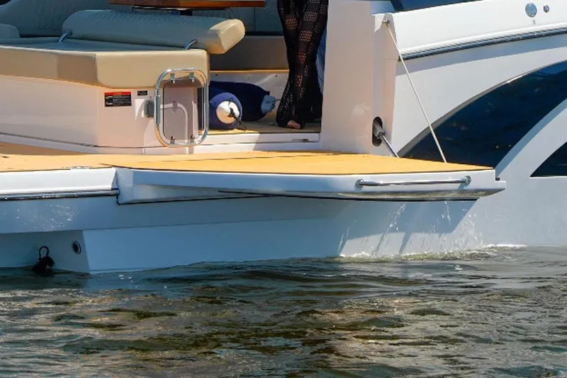 Slide: The Image of Luxury Hanover 347 yacht, 2026 model, featuring sleek design and spacious deck on water. - 6