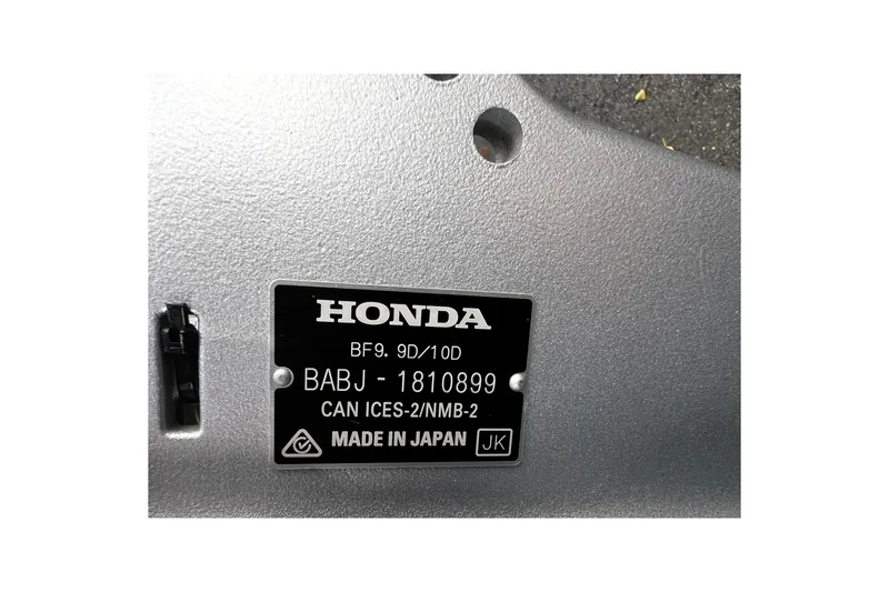 Slide: The Image of Honda engine label on a 2018 Hewescraft 220 Ocean Pro ET HT boat. - 13