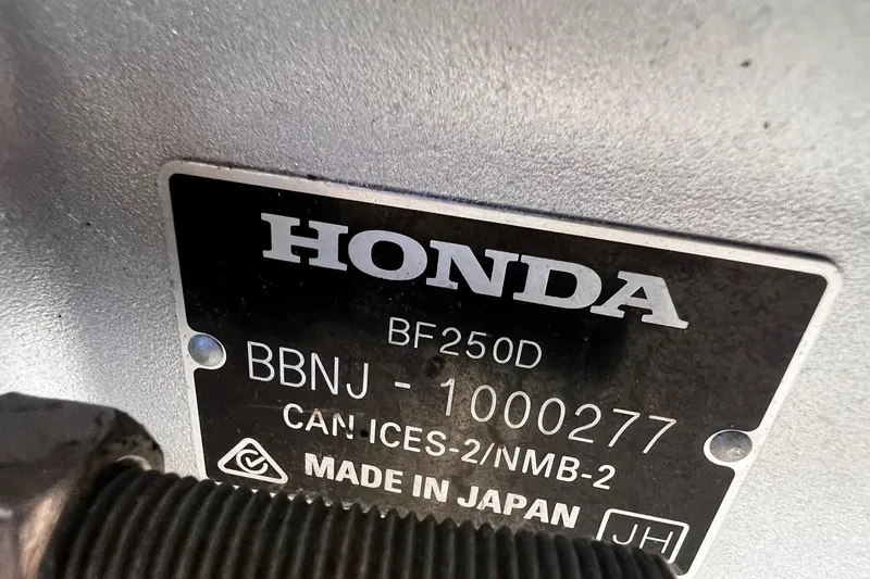 Slide: The Image of Honda BF250D engine label, serial number BBNJ-1000277, made in Japan. - 14