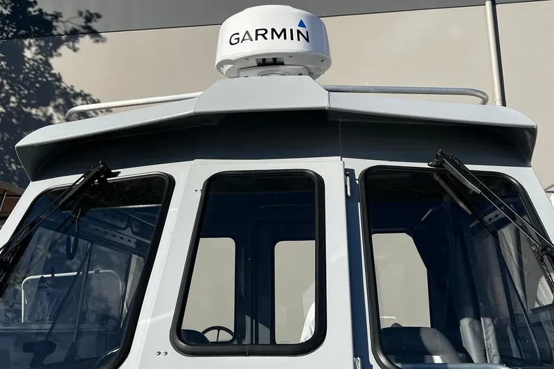 Slide: The Image of 2018 Hewescraft 220 Ocean Pro ET HT boat with Garmin radar on top. - 3