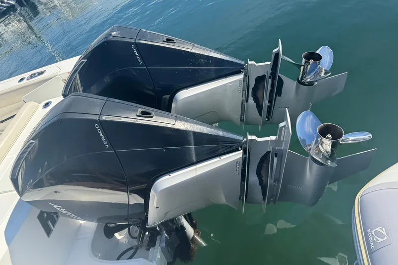 Slide: The Image of Twin outboard engines on a 2019 Boston Whaler 330 Outrage boat. - 4