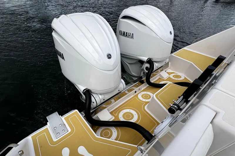 Slide: The Image of 2001 Grady-White Express 330 boat with twin Yamaha outboard engines. - 11