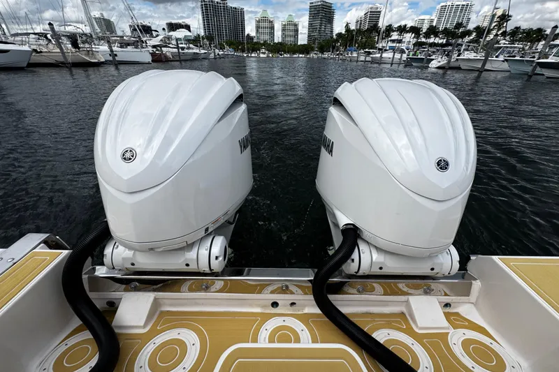 Slide: The Image of 2001 Grady-White Express 330 with twin Yamaha outboard engines at marina. - 13