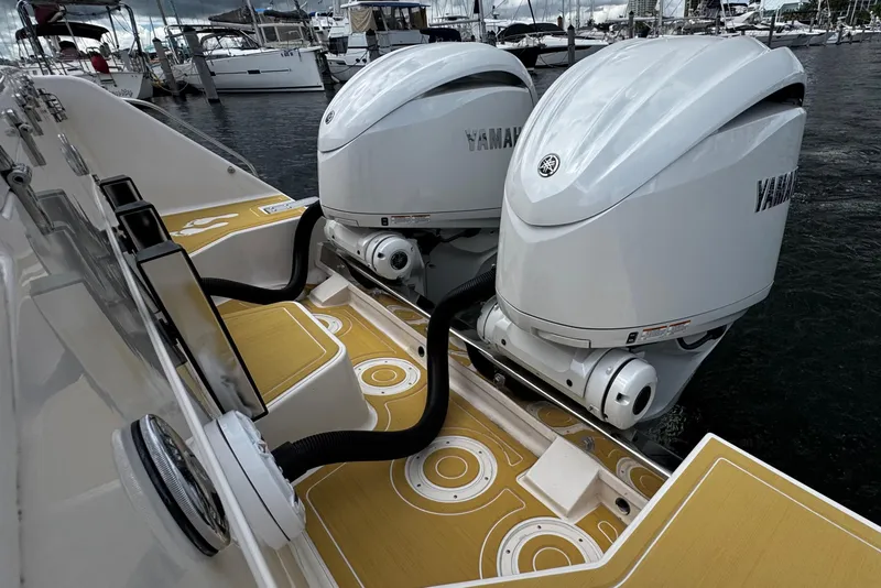 Slide: The Image of 2001 Grady-White Express 330 with twin Yamaha outboard engines at marina. - 14