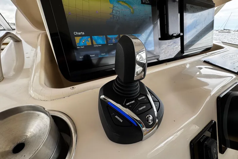 Slide: The Image of Joystick control and navigation display on 2001 Grady-White Express 330 boat. - 45