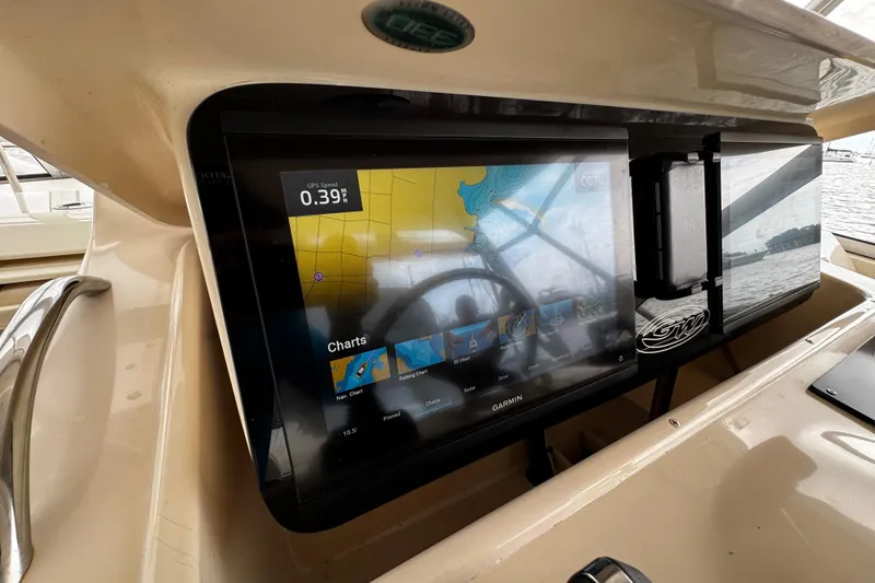 Slide: The Image of Navigation display on 2001 Grady-White Express 330 boat, showing GPS and charts. - 46