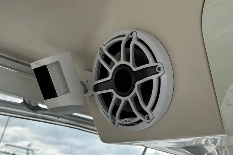Slide: The Image of Ring camera and JL Audio speaker on 2001 Grady-White Express 330 boat. - 48