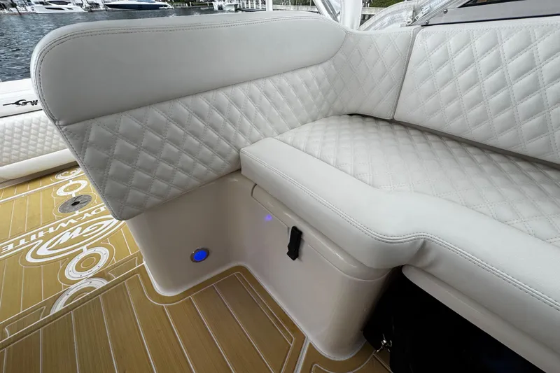 Slide: The Image of Luxurious seating on 2001 Grady-White Express 330 boat with quilted upholstery. - 49