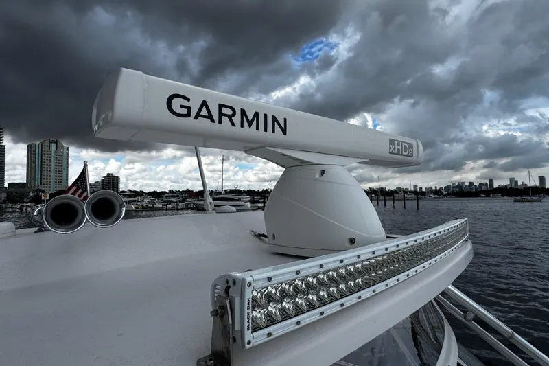 Slide: The Image of Grady-White Express 330 boat with Garmin radar under stormy skies, 2001 model. - 56