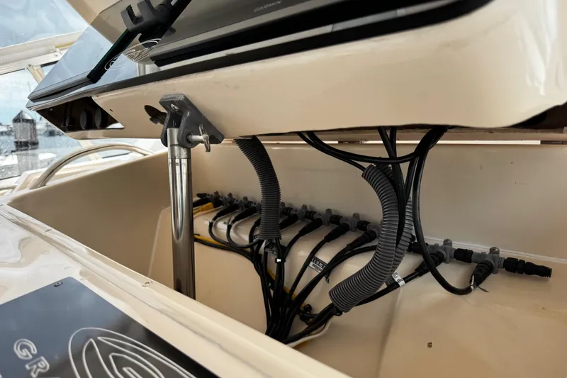 Slide: The Image of 2001 Grady-White Express 330 boat wiring and control panel detail. - 80