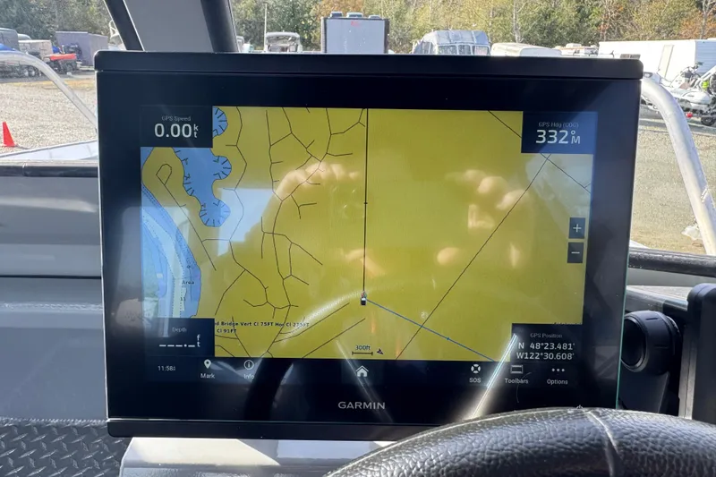 Slide: The Image of Garmin GPS display on 2023 Hewescraft 210 Sea Runner ET HT boat dashboard. - 16