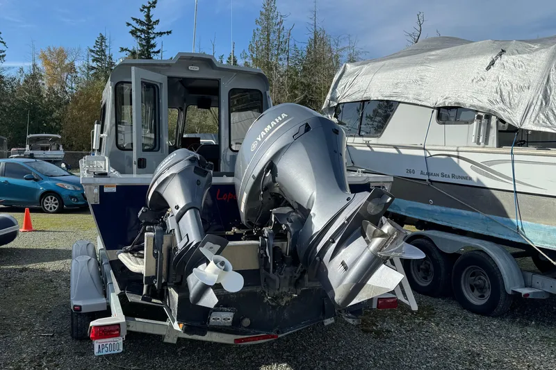 Slide: The Image of 2023 Hewescraft 210 Sea Runner ET HT with Yamaha outboard motors on trailer. - 9