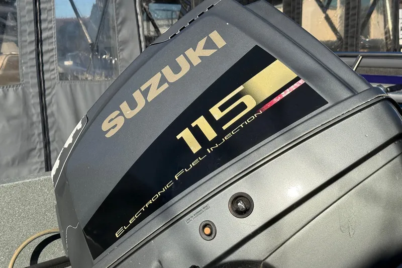 Slide: The Image of Suzuki 115 electronic fuel injection outboard motor on Harbor Craft Nahanni 1925 SK, 2000 model. - 11
