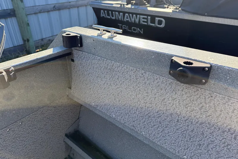 Slide: The Image of Interior view of a 2000 Harbor Craft Nahanni 1925 SK boat, featuring textured surfaces. - 26