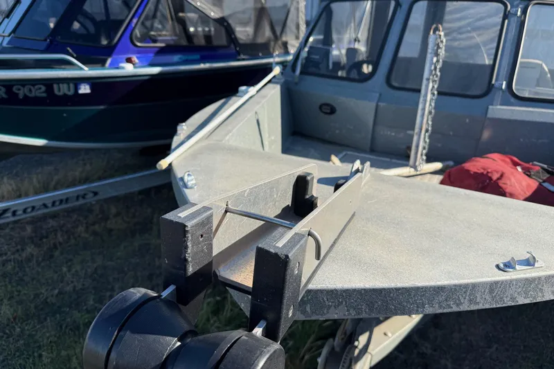 Slide: The Image of Boat trailer with Harbor Craft Nahanni 1925 SK, year 2000, in a storage area. - 6