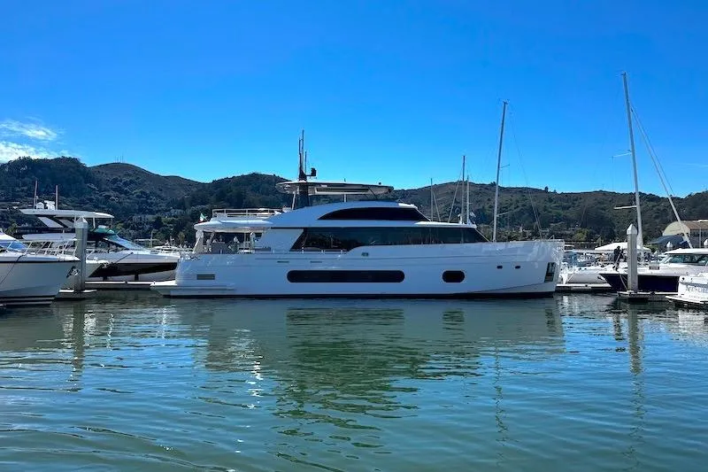 Slide: The Image of Azimut Grande Magellano 25 Metri yacht cruising at sunset, 2026 model. - 1