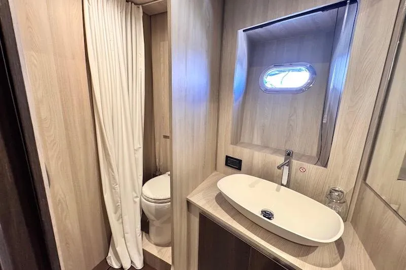 Slide: The Image of Luxurious interior of 2026 Azimut Grande Magellano 25 Metri yacht with cozy bunk beds. - 21