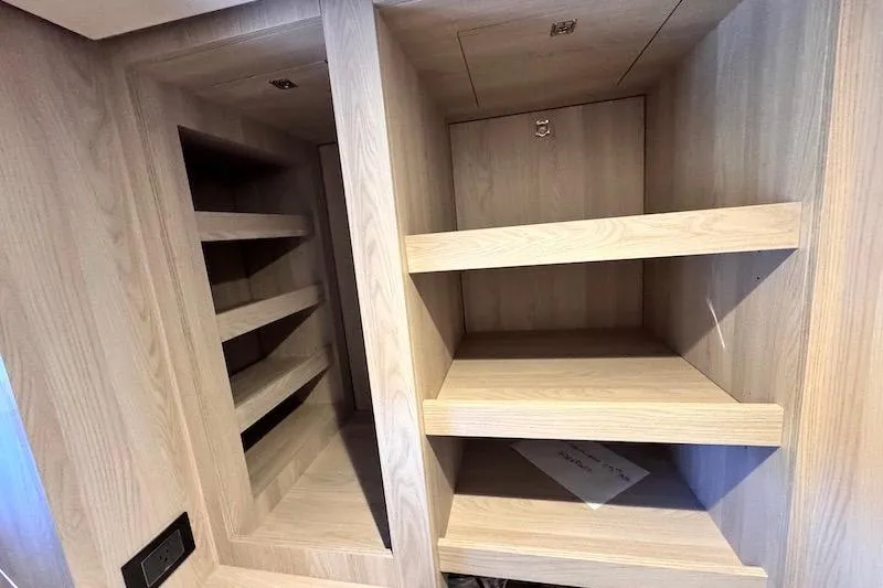 Slide: The Image of Laundry area in 2026 Azimut Grande Magellano 25 Metri yacht with washer and dryer. - 24