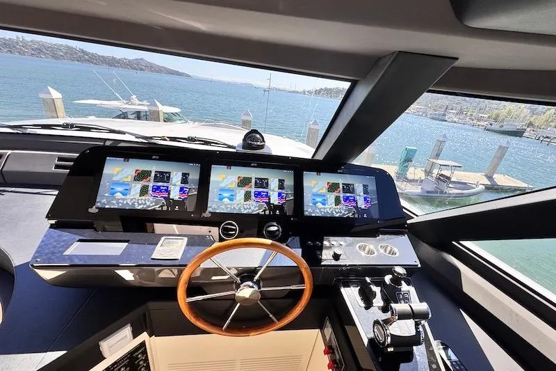Slide: The Image of Luxurious helm of 2026 Azimut Grande Magellano 25 Metri yacht with advanced navigation displays. - 29