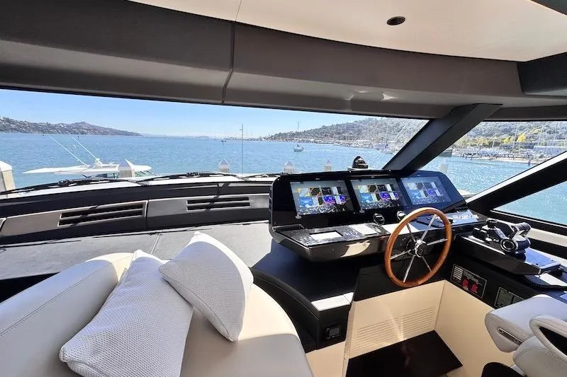 Slide: The Image of Luxurious interior of 2026 Azimut Grande Magellano 25 Metri yacht with modern navigation screens. - 31