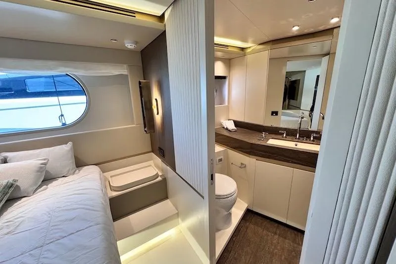 Slide: The Image of Luxurious bedroom interior of 2026 Azimut Grande Magellano 25 Metri yacht, featuring elegant design. - 55