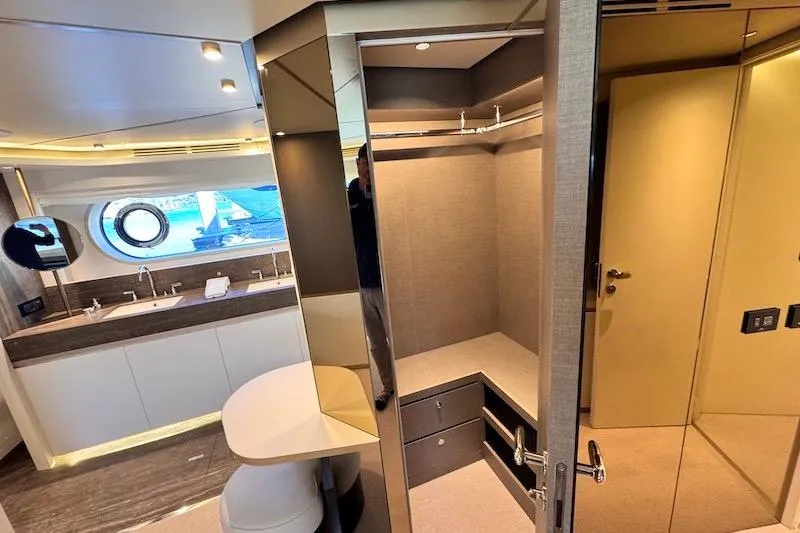 Slide: The Image of Luxurious interior of 2026 Azimut Grande Magellano 25 Metri yacht, featuring modern bedroom and bathroom. - 66