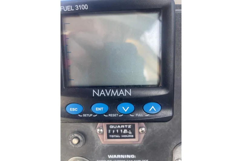 Slide: The Image of Navman display on 2001 Monterey 270 Cruiser dashboard with control buttons. - 19