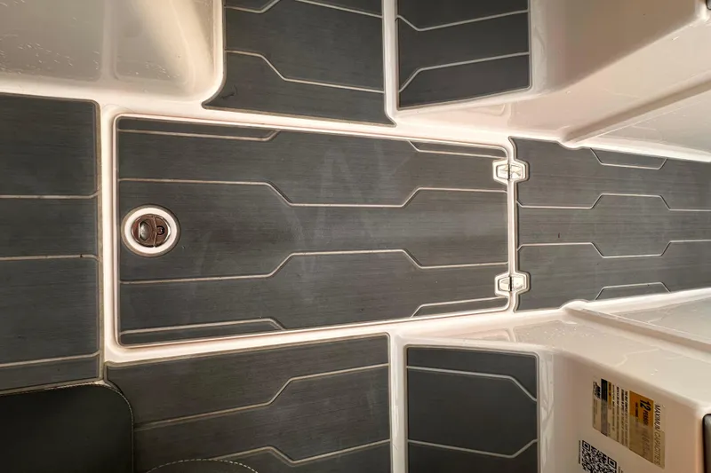 Slide: The Image of 2020 Regal LS2 Surf boat deck with sleek, modern design and durable flooring. - 15