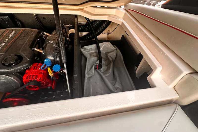 Slide: The Image of Engine compartment of 2020 Regal LS2 Surf boat with Volvo Penta engine. - 27