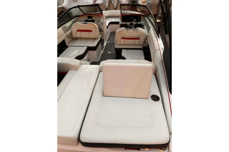 Slide: The Image of 2020 Regal LS2 Surf boat interior with luxurious seating and modern design. - 7