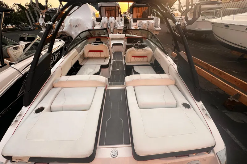 Slide: The Image of 2020 Regal LS2 Surf boat interior with spacious seating and sleek design. - 9