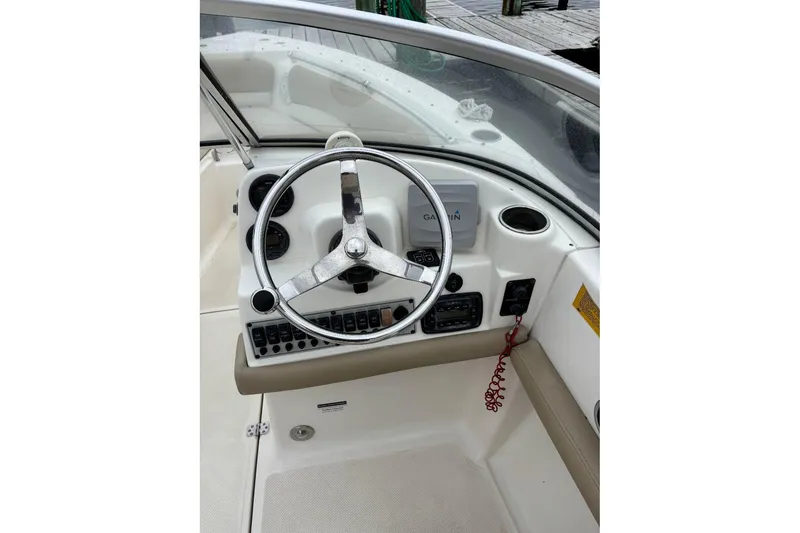 Slide: The Image of Steering console of 2014 Key West 211 Dual Console boat with Garmin navigation system. - 9
