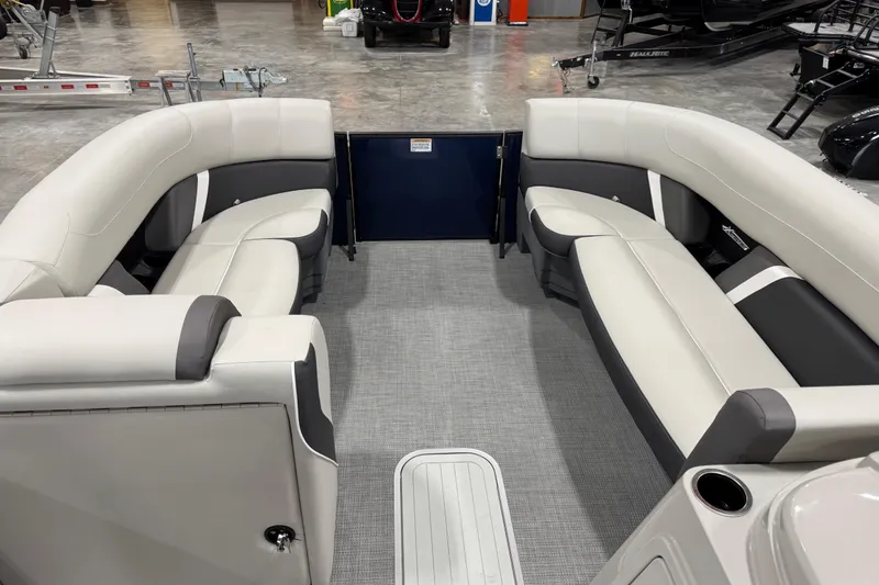 Slide: The Image of Interior of 2025 Sylvan X-5 boat with spacious seating and modern design. - 12