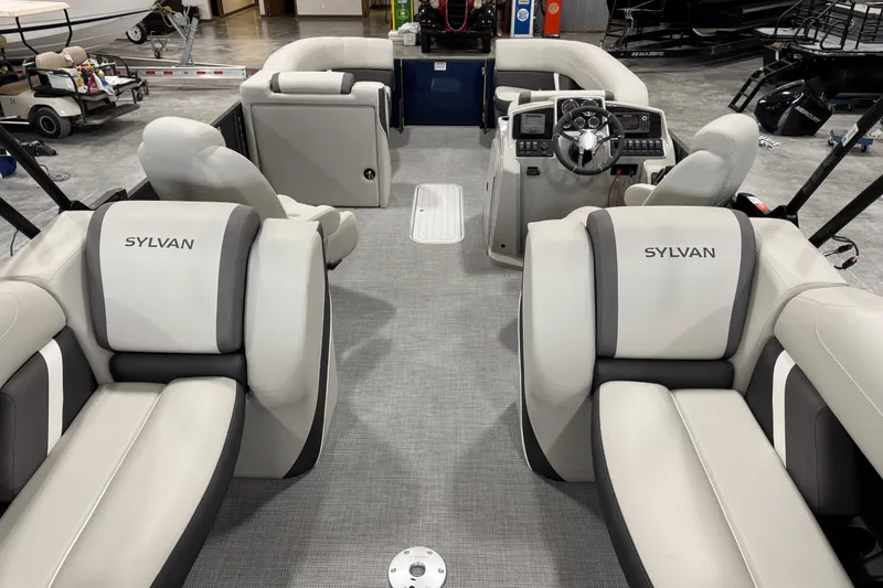 Slide: The Image of Interior of 2025 Sylvan X-5 boat with luxurious seating and modern dashboard. - 8