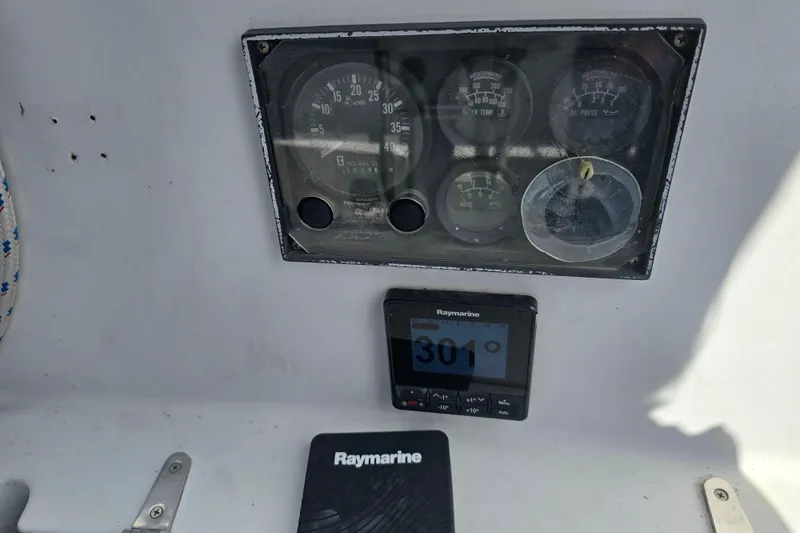 Slide: The Image of Instrument panel of a 1987 Nonsuch 30 Ultra sailboat with Raymarine display. - 15