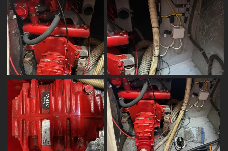 Slide: The Image of Engine compartment of a 1987 Nonsuch 30 Ultra sailboat, featuring red mechanical components. - 27