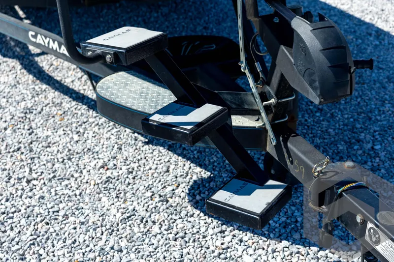 Slide: The Image of 2023 Caymas CX19 boat with Garmin electronics, sleek blue and gray design. - 10