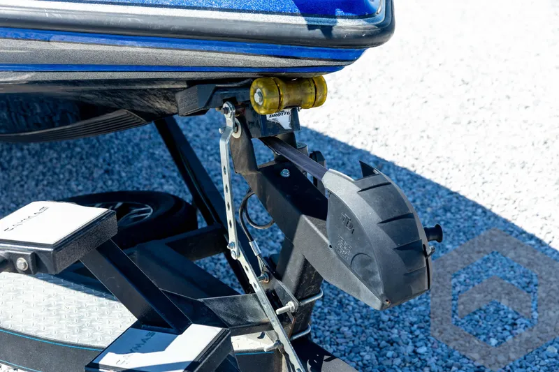 Slide: The Image of 2023 Caymas CX19 boat with powerful outboard motor on a trailer. - 11