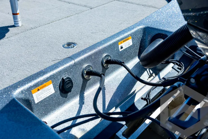 Slide: The Image of 2023 Caymas CX19 boat engine and propeller on gravel surface. - 28