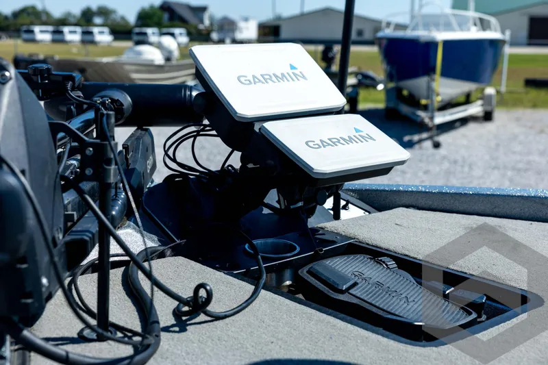 Slide: The Image of 2023 Caymas CX19 boat with Garmin electronics and foot pedal on deck. - 38