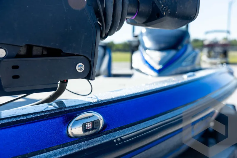 Slide: The Image of 2023 Caymas CX19 boat interior with dual seats and sleek dashboard design. - 39