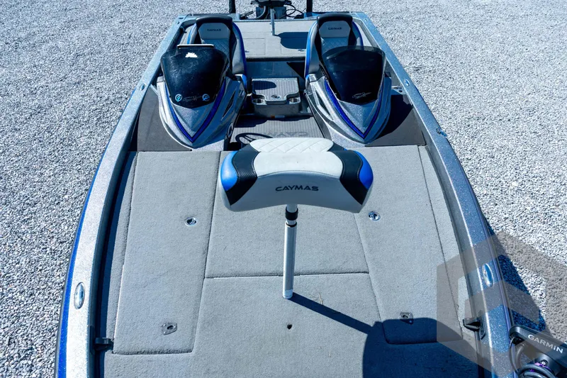 Slide: The Image of 2023 Caymas CX19 boat interior with Garmin system and dual seats. - 42