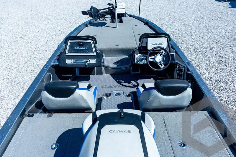 Slide: The Image of 2023 Caymas CX19 boat dashboard with logo and control panel. - 43