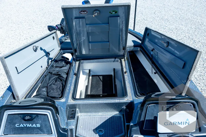 Slide: The Image of 2023 Caymas CX19 boat interior with sleek console and stylish seating. - 45